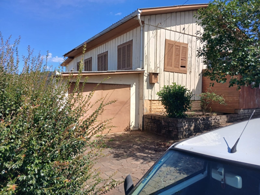 CASA COM 3 DORMITÓRIOS